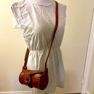 Unique cylindrical shape leather Bag. Handmade in Mexico